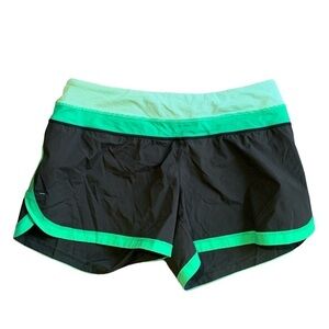 LULULEMON Groovy Run shorts size 8 black with green